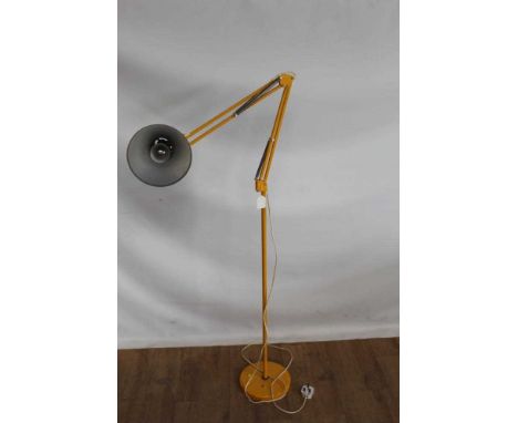 Yellow adjustable anglepoise lamp