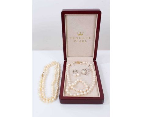 Two cultured pearl necklaces, pair of cultured pearl earrings and a cultured pearl silver dress ring