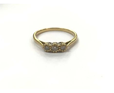 18ct gold diamond three stone ring, size RWeight 2.7 grams 