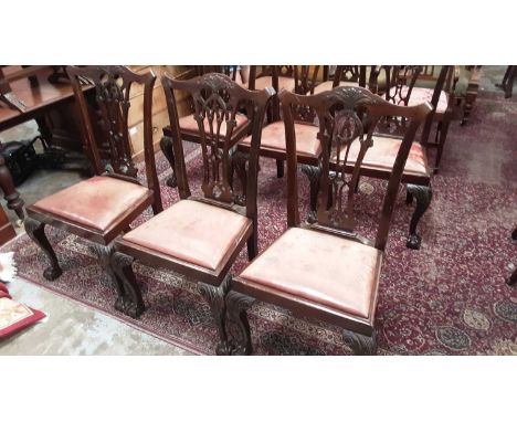 Set of eight Edwardian Chippendale Revival carved mahogany dining chairs together with a dismantled dining table