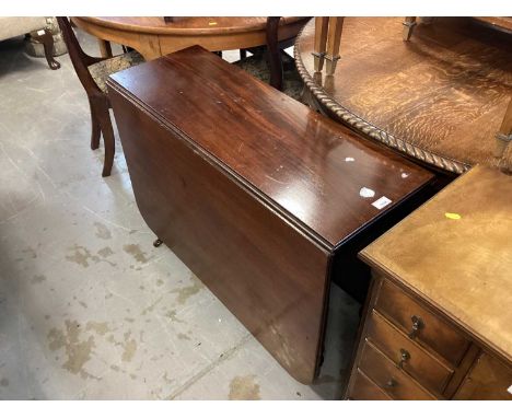 19th century mahogany drop-flap dining table on ring turned legs