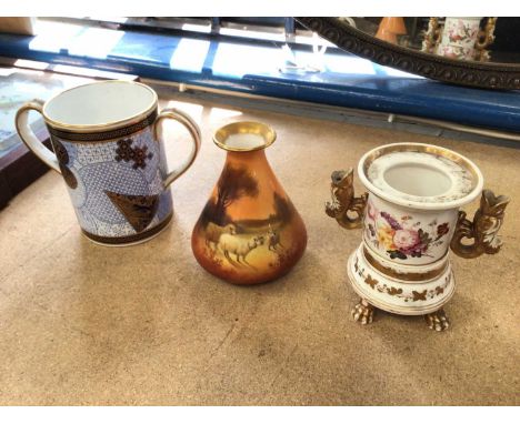 A Royal Doulton vase painted with sheep, a Royal Worcester aesthetic style loving cup, and a 19th century inkwell, possibly C