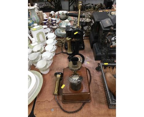 Candlestick Telephone (converted into a lamp) together with two other vintage telephones.
