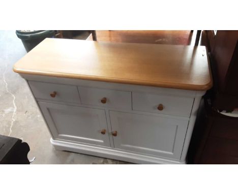 Contemporary light oak and painted sideboard with three drawers and two panelled doors below, 119cm wide, 45cm deep, 85cm hig