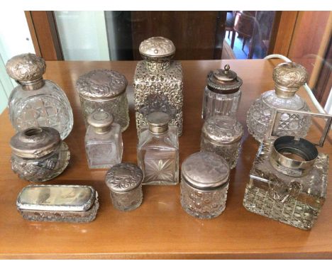 Group of silver mounted glass bottles and inkwell