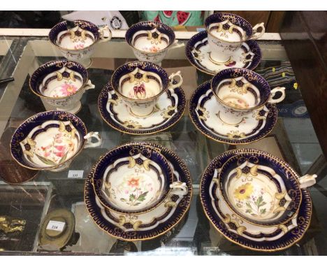 Victorian floral painted tea cups and saucersOne saucer has a hairline. All the cups have cracks, breaks or repairs.