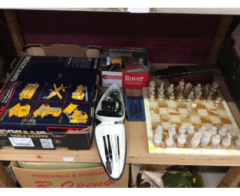 Meccano set and an onyx chess set, student microscope and sundries