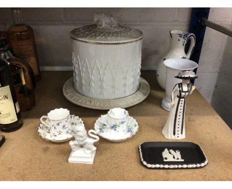 Group of ceramics, including a Victorian cheese dome, Royal Worcester and Copeland cups and saucers, Nymphenburg lion, Wedgwo