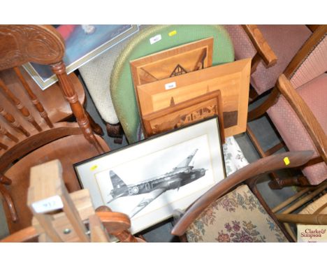Three marquetry inlaid panels and a Roland Crowley sketch of a bomber 