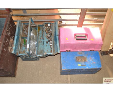 A cantilever tool box with some tools; another two toolboxes with contents