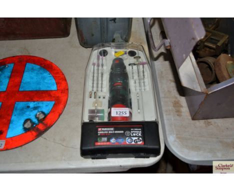 A Parkside cordless 12V multi grinder in case, with various attachments