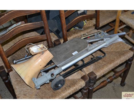 A folding suitcase carrier, speaker, stainless steel shovel etc.