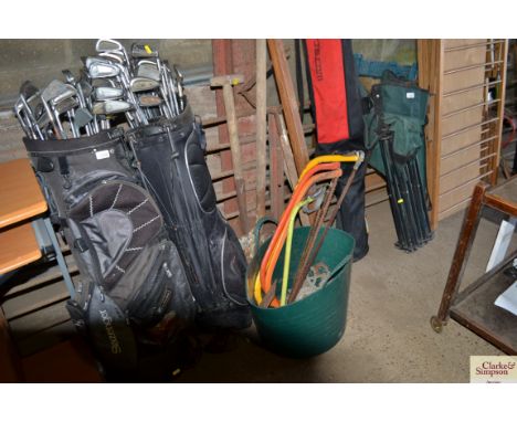 A quantity of long handled garden tools; a plastic trug; bow saws etc.