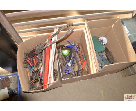 Three large boxes of tools including spanners, stilsons, drill bits etc.