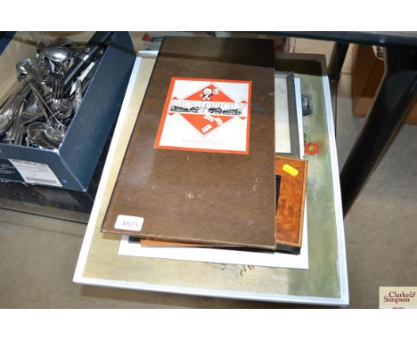 A quantity of picture frames and pictures and prints