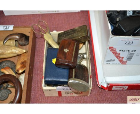 A box containing snuff boxes; compass; small set of scales etc