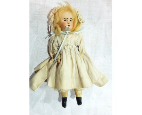 SFBJ bisque headed doll marked "SFBJ 60, Paris 13/0" with painted features, wooden painted body, wearing white dress and cloa