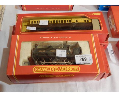 Hornby Railways 'OO' gauge Great Western tank engine, class 2721, No.R706 together with a Hornby restaurant car and two Trian