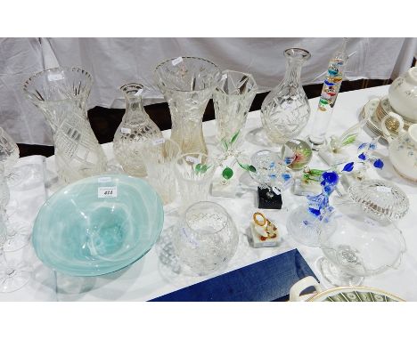 An Art glass bowl, two cut glass decanters with out-stoppers, various cut and moulded glass vases, glass ornaments featuring 