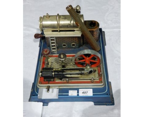 A Wilesco steam engine generator having brick-effect boiler system 