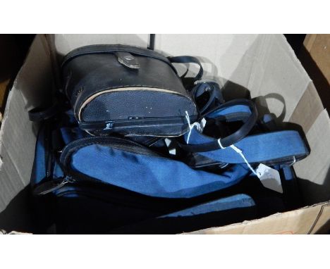 A quantity of camera equipment including APM Limited foldaway camera, a pair of Prinz 8x40 binoculars and other items 