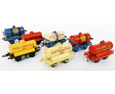 Seven Hornby 'O' gauge tanker trucks for Shell Lubricating Oil, Colas (blue tank), Colas (red tank), United Dairies, BP Motor