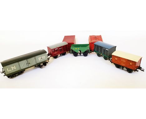 A Hornby 'O' gauge Luggage Van LNER; two No.1 Milk Traffic Vans, both boxed; a Hopper Wagon and a No.1 Fish Van (5) 