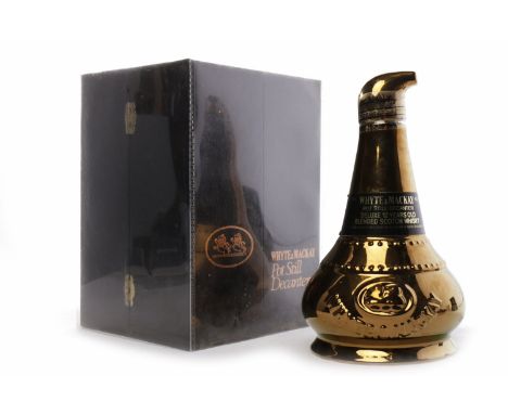 WHYTE & MACKAY 12 YEAR OLD POT STILL DECANTER
Blended Scotch Whisky.
75cl, 43% volume, in display box.  CONDITION REPORT: Fil