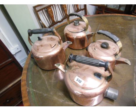 Four Antique Copper Kettles and Antique Tilly Lamp