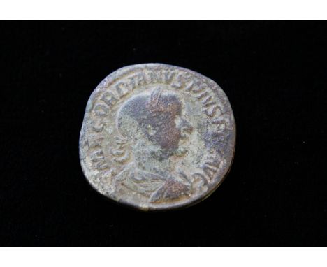 Roman. Sestertius. Gordian III 238-244AD. Reverse of Jupiter standing facing right, scepter in right hand, thunderbolt in lef