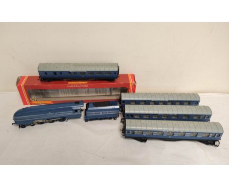 Hornby 00 gauge R685 "Coronation" LMS 6220 blue model engine with four accompanying Hornby R4906 "Coronation Scot" carriages.