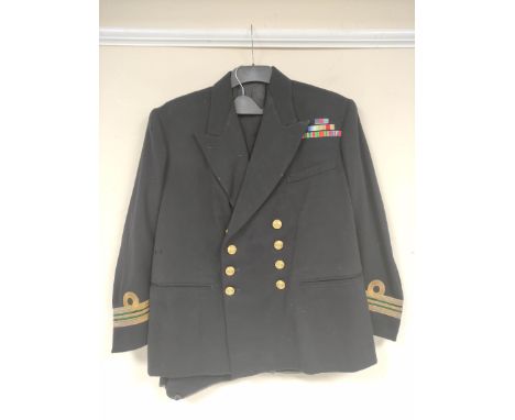 British Royal Navy uniform, a black jacket with Baker and Co of Portsmouth label "G W NICHOLLS 12-8-55 553" having Firmin of 