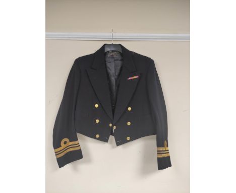 British Royal Navy uniform, a black dress jacket with Wilkinson and Co of Southsea label having Firmin of London naval brass 