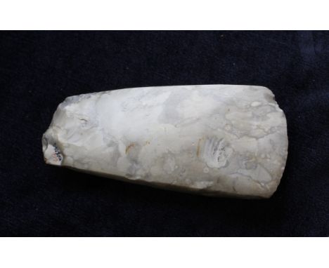 Neolithic- Danish polished axe head constructed from grey marbled flint. The implement was found in Voidingboig, Isle of Funi