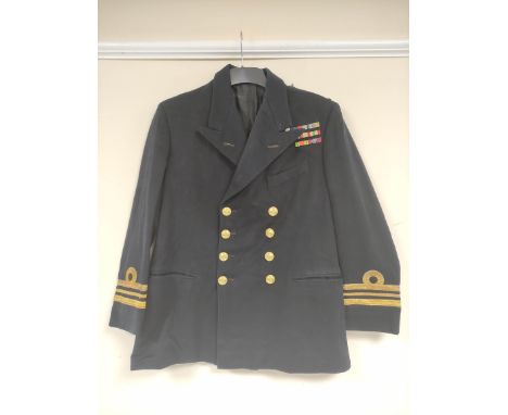 British Royal Navy uniform, a black jacket with Stovel and Mason of London label "LT CDK R G PENNEL RN 27.5.46" having Gaunt 