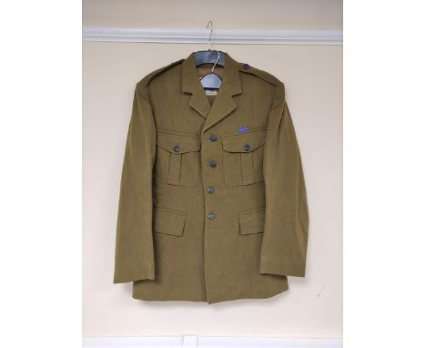 British/Irish Army uniform jacket with Briggs, Jones and Gibson Ltd label "Size 22", having black harp buttons and medal ribb