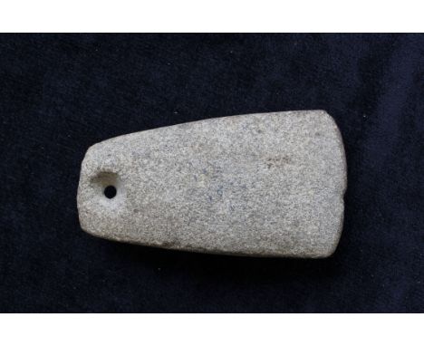 Neolithic- Danish greenstone axe head with pierced butt for the attachment of twine. The implement was found in Vordingburg, 