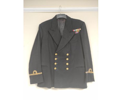 British Royal Navy uniform, a black jacket with Baker and Co of Portsmouth label "3 WATSON 9.2.53 9011", having Firmin of Lon