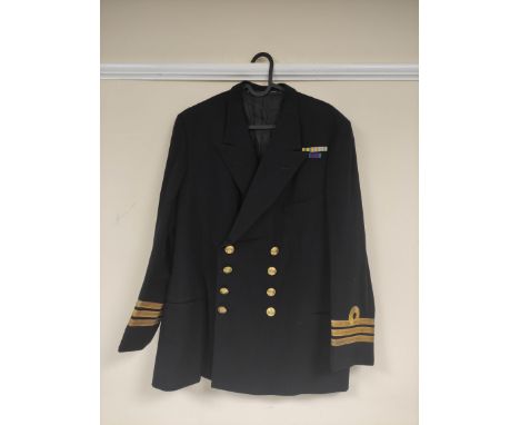 British Royal Navy uniform, a black jacket with Moseley and Pounsford Ltd of Portsmouth label "R T CLARKE 14-2-59 1647" havin