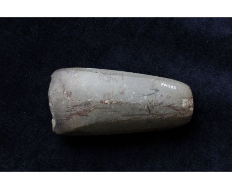 Neolithic- German polished stone axe head with chipped edge. The axe head originates from central Germany and likely belongs 