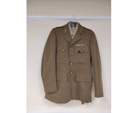 British Army uniform, an olive green jacket with Bernard Weatherill Ltd label "2482 J BURNETT 16.2.43" having Gaunt and Son o