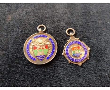 Two silver &amp; enamel football medals by Fattorini &amp; Sons including a Cumberland Football Association medal issued to t