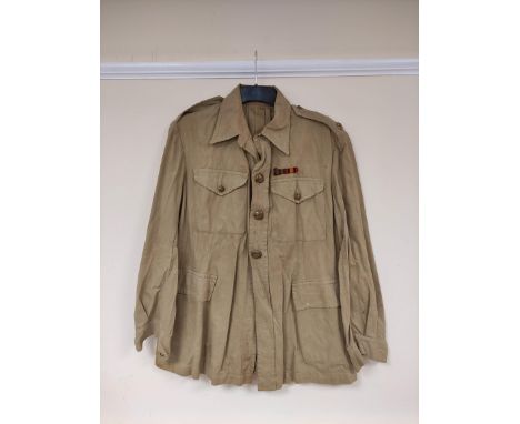 British Army uniform, a light stone summer jacket having Firmin&nbsp;and Sons of London Royal Artillery brass buttons, epaule