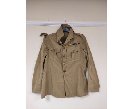 British Army uniform, a light stone summer jacket having Royal Engineers brass buttons, RE shoulder titles and medal ribbons 