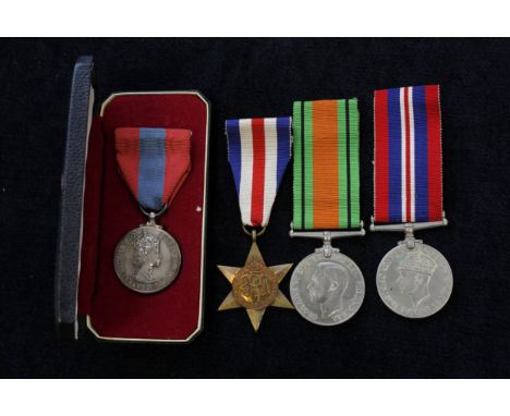 WW2 medal group: France &amp; Germany Star, 1939-45 War Medal, Defence Medal &amp; later QE II Imperial Service Medal (4) 