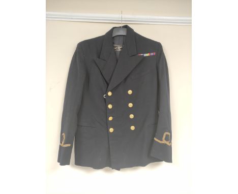 British Royal Navy uniform, a black jacket with Chas C Whitelock of Leeds label having Gaunt and Son of London naval brass bu