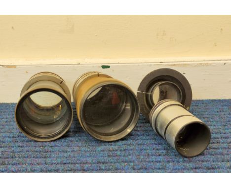 Four 1940s projector lenses to include one by A. Kershaw &amp; Sons&nbsp; Leeds, in Khaki field green. (4). 