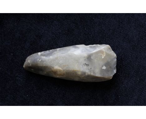 Neolithic- Danish flint concave adze of smooth marbled grey flint. The implement was found on the Isle of Funin and belongs t