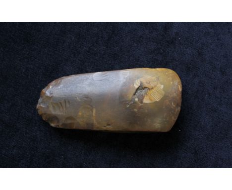 Neolithic- Polished axe head of amber coloured flint likely Danish in origin. 15cm.