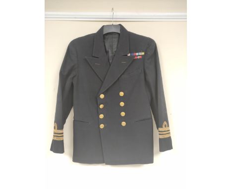 British Royal Navy uniform, a black jacket with Baker and Co of Portsmouth label "F BENOY RN" having naval brass buttons, bul